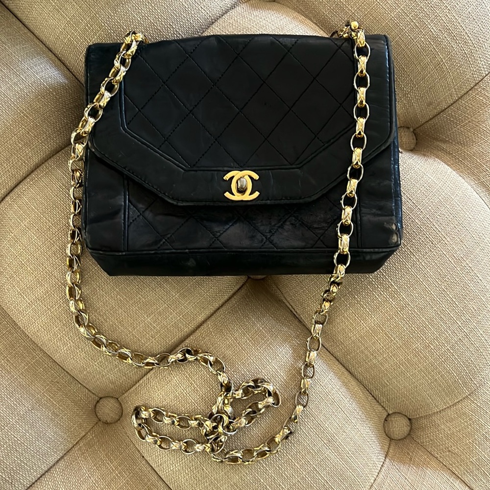 Used Chanel bag. Black cross body or shoulder. Super cute!